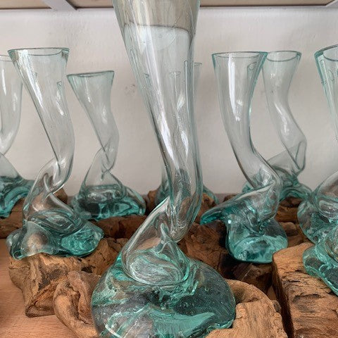 Swirly glass vase on root