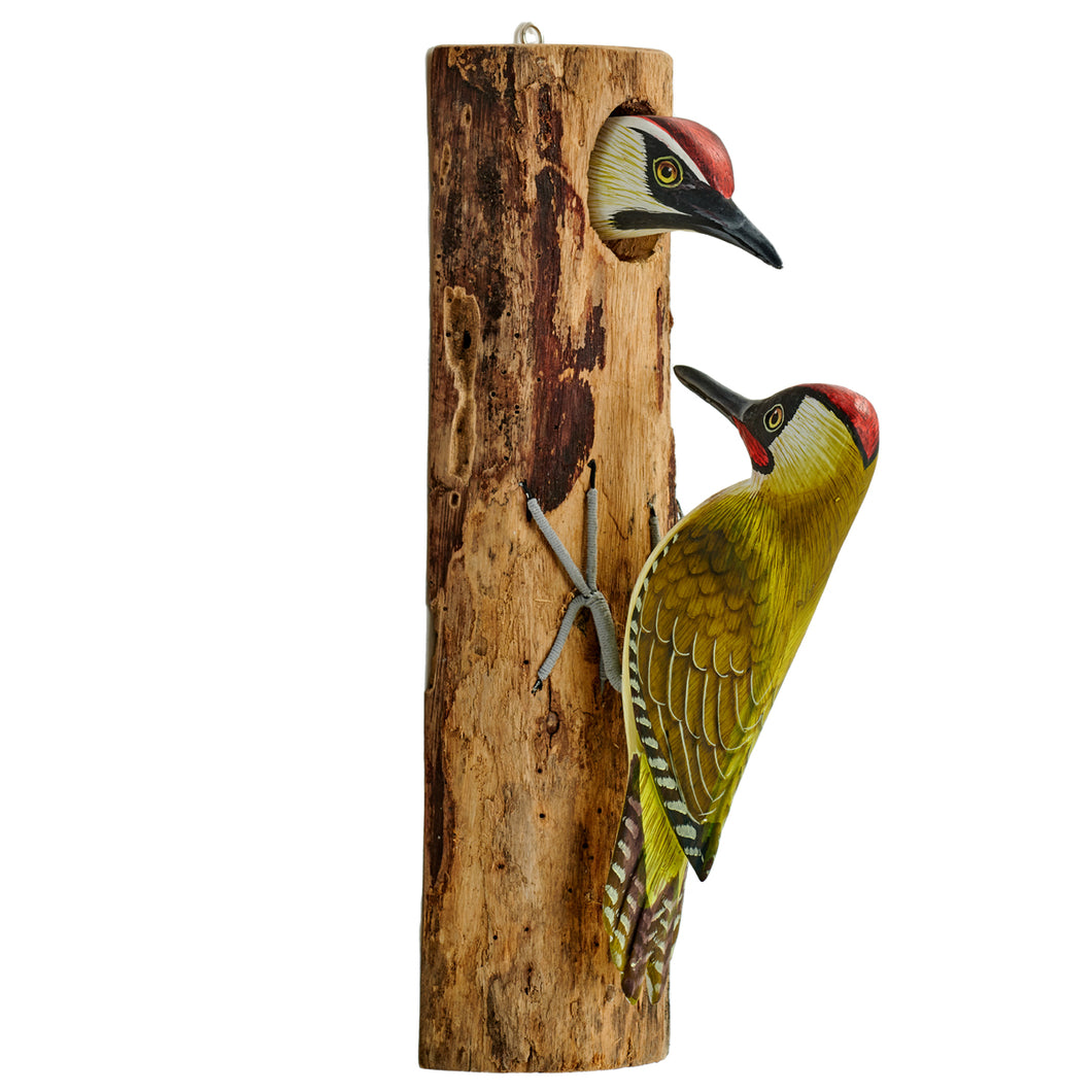 Wall mounted two green woodpeckers on half driftwood